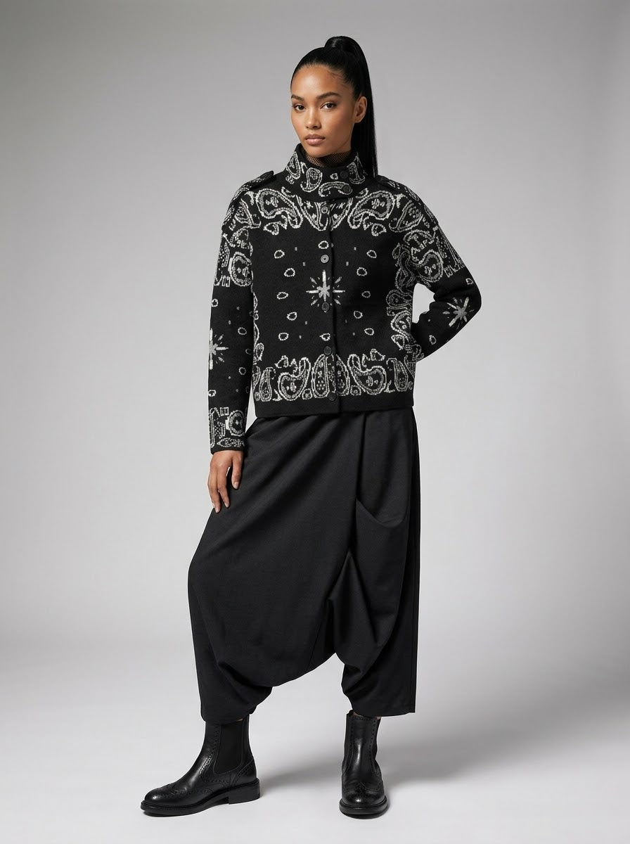 Model wearing Sadie paisley knitted jacket in black, full front view