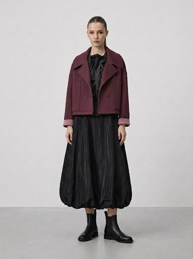 Model wearing burgundy Bronte cropped jacket open, full front view