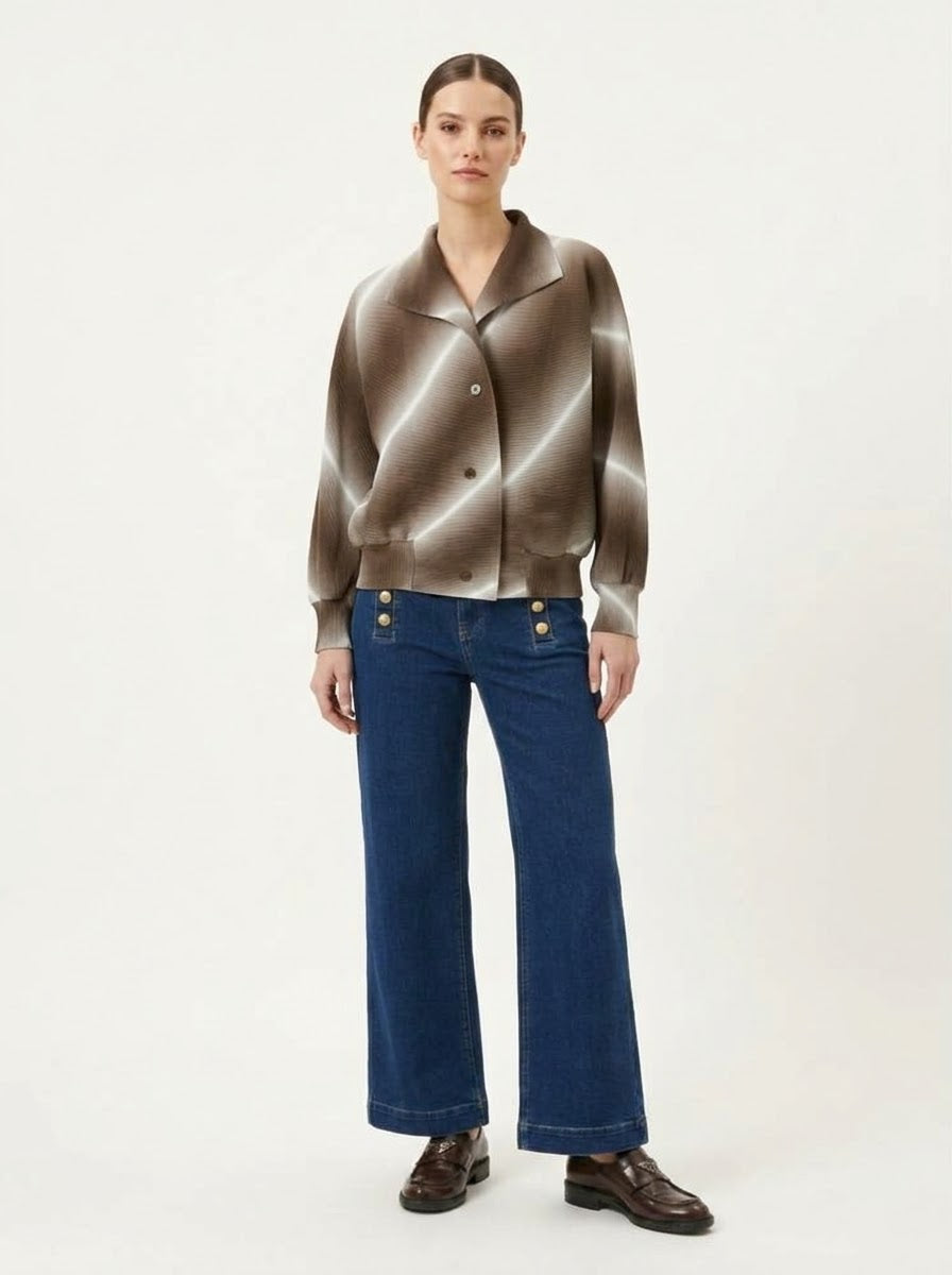 Model wearing Juliette pleated bomber jacket in khaki, front view