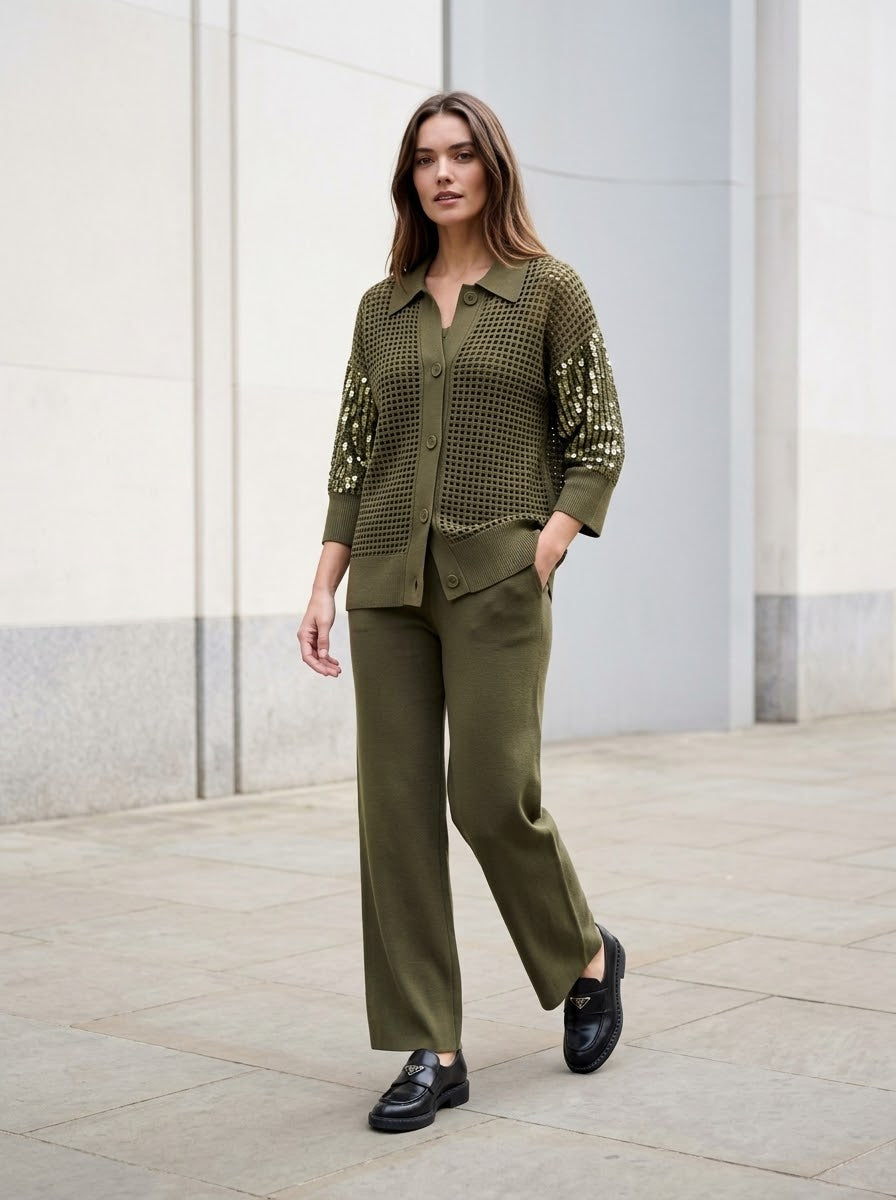 Side view of the Janey khaki cardigan showing its relaxed fit