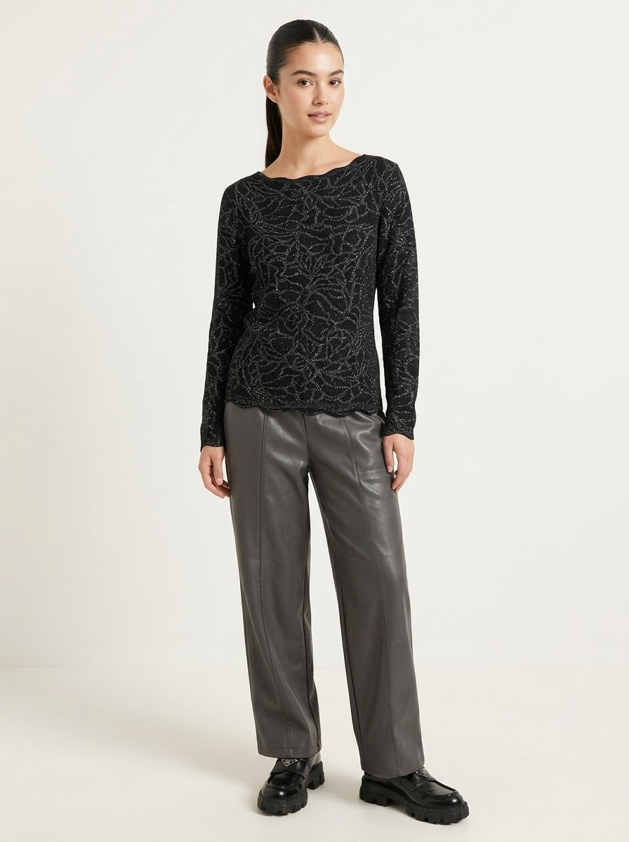 Front view of the Imani black jumper showing its tonal pattern