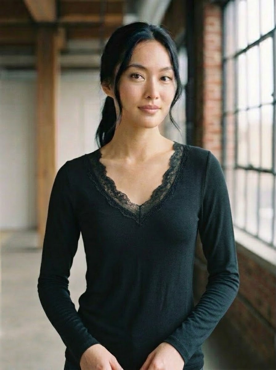 Mollie black soft-touch lace top styled on model