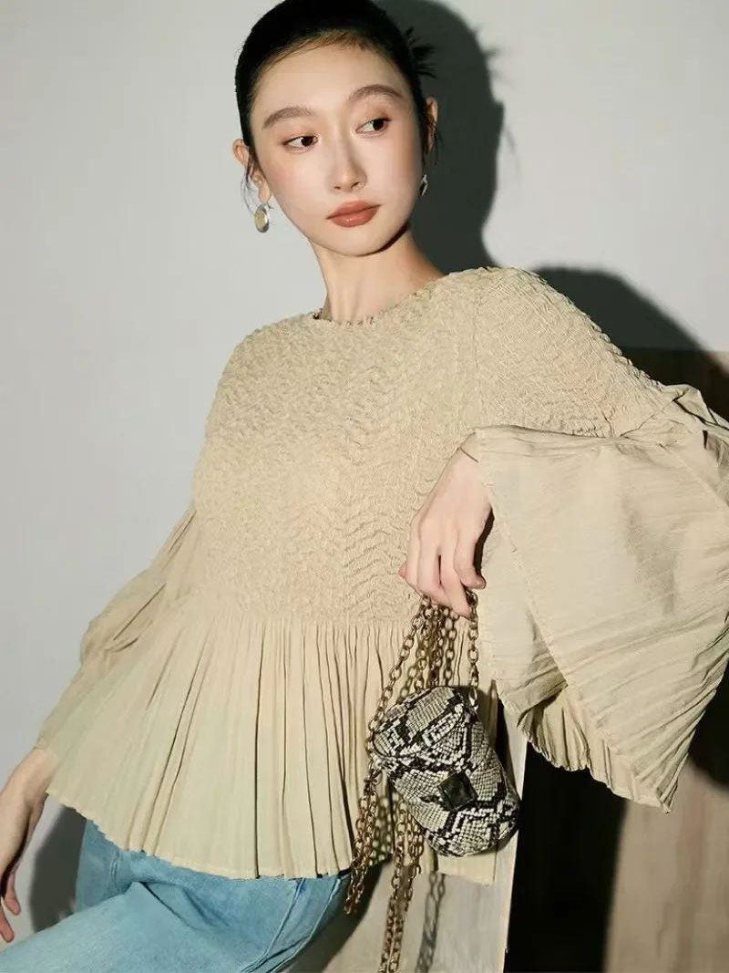 Miranda - Peplum hem part pleated top